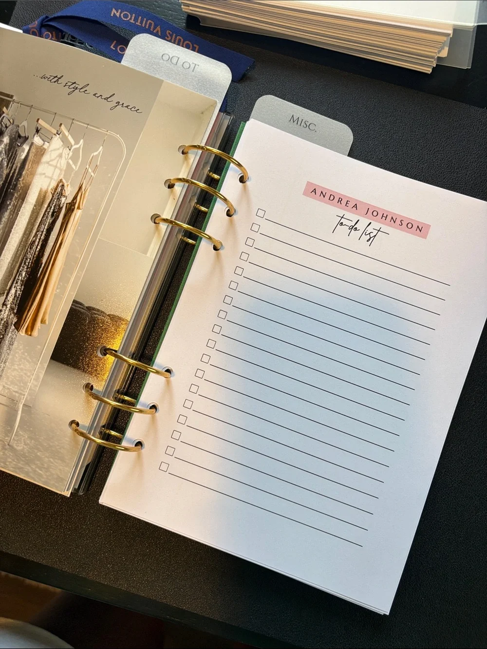 A5 Planner Pages with Blue Ribbon and Gold Rings.